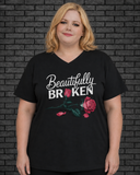 Plus size model wearing black v neck shirt with Beautifully Broken design