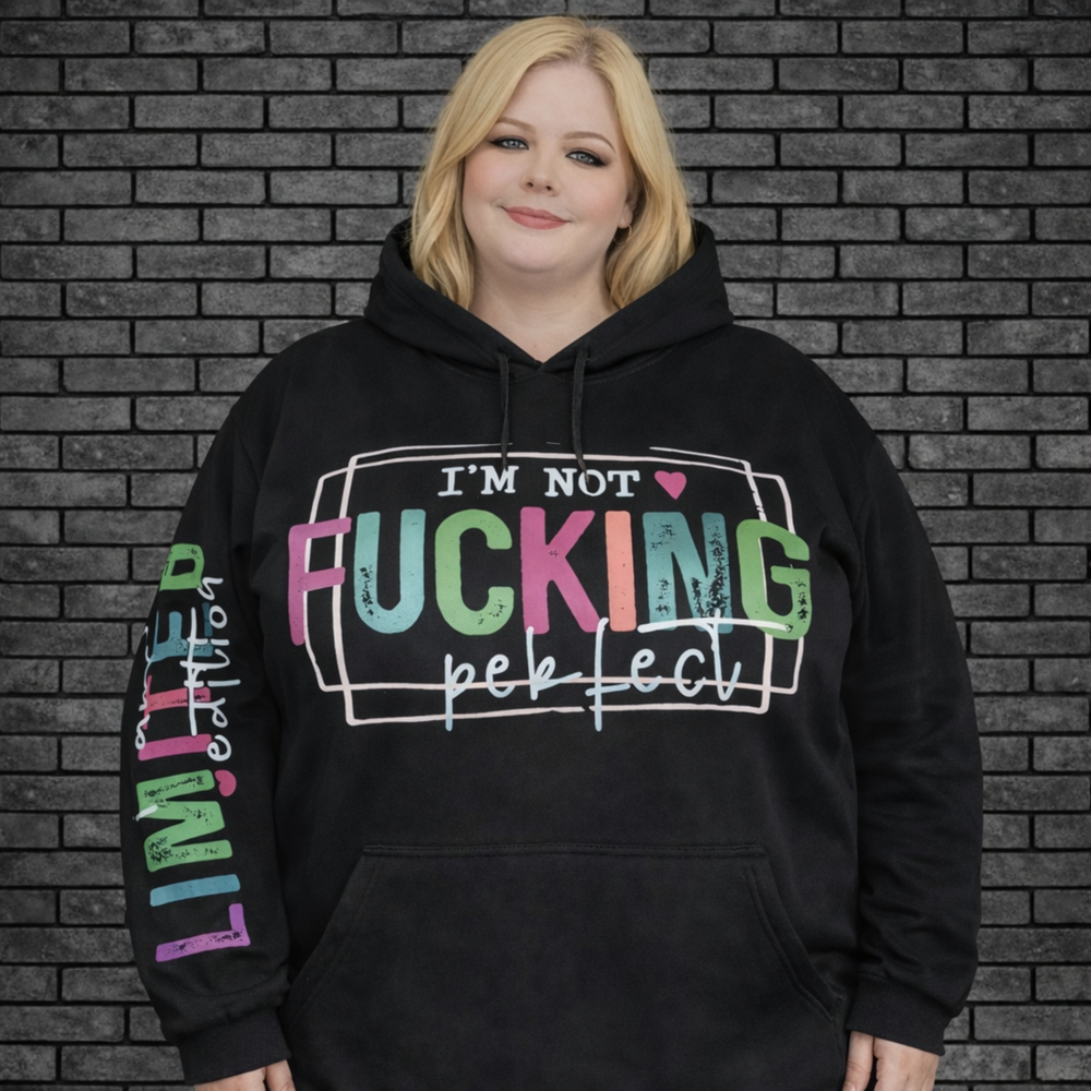 Plus size model wearing black oversized hoodie saying I'm Not Fucking Perfect