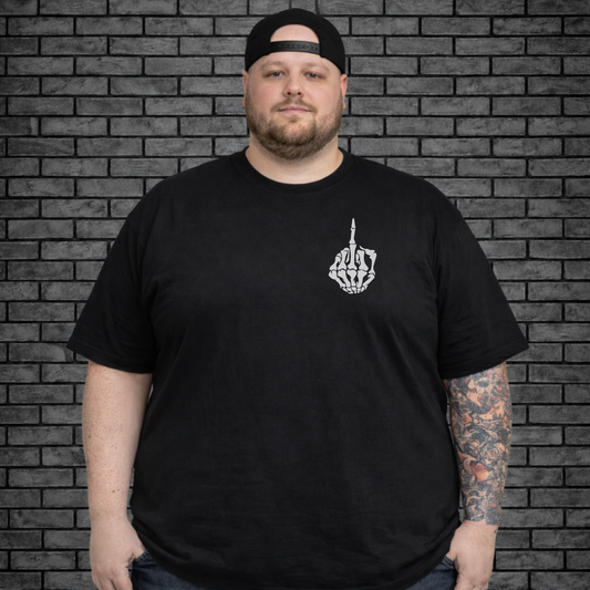 Plus size male model wearing a black short sleeve shirt from the front with a skeleton hand giving the finger