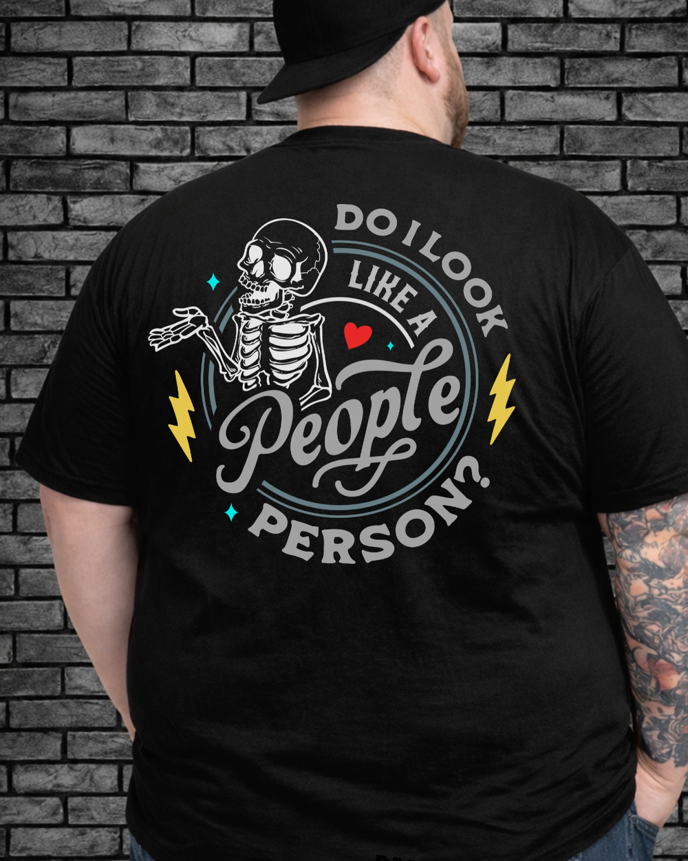 Plus size model wearing a black I Do What My Wife Wants Tee, view from back