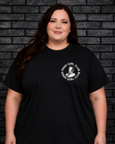 Plus size model wearing black crew neck Good Girl Tee