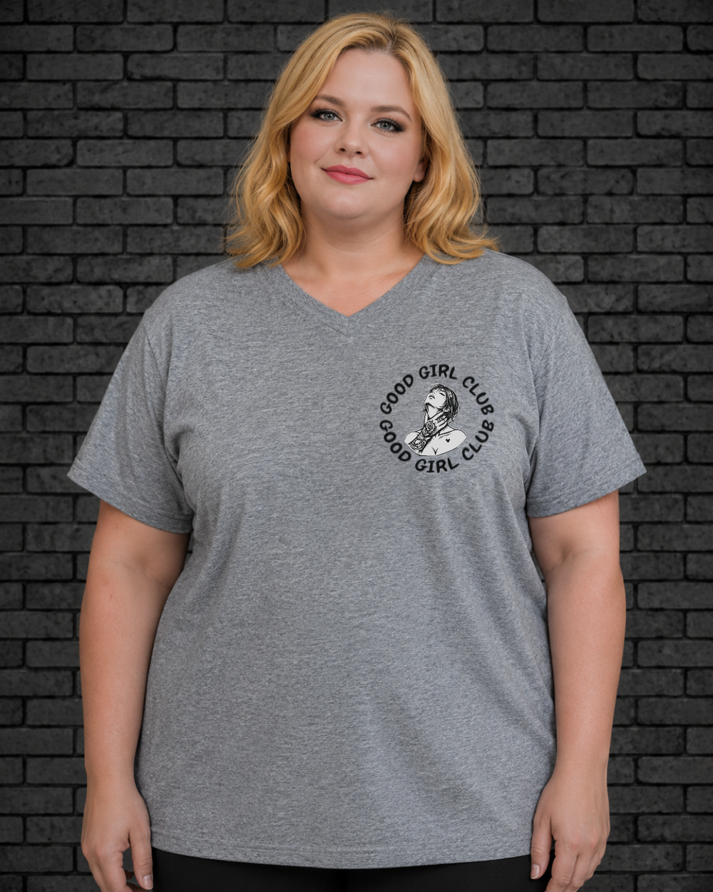 Plus size model wearing grey v neck Good Girl Tee