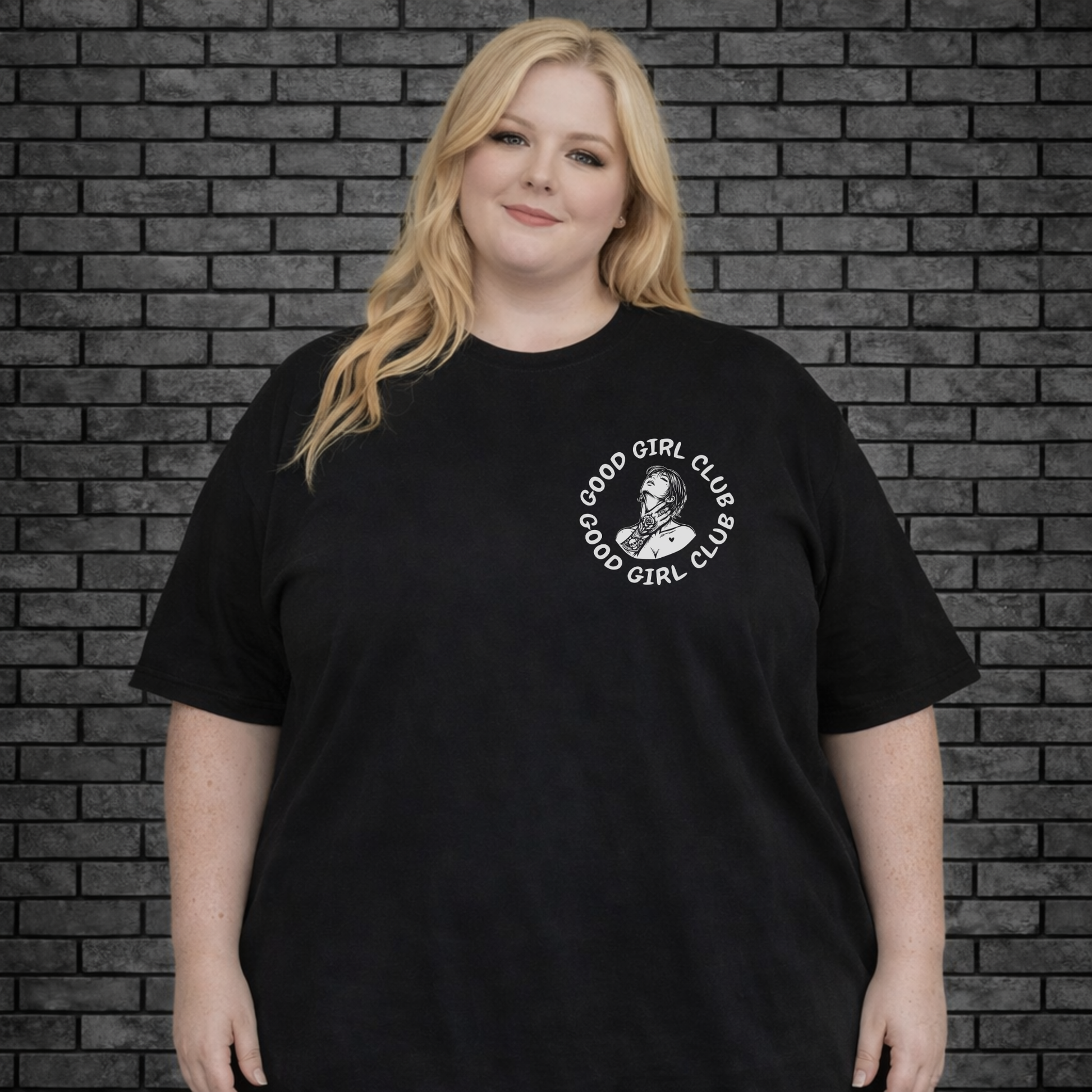 Plus size model wearing black short sleeve shirt with Good Girl Club on left pocket