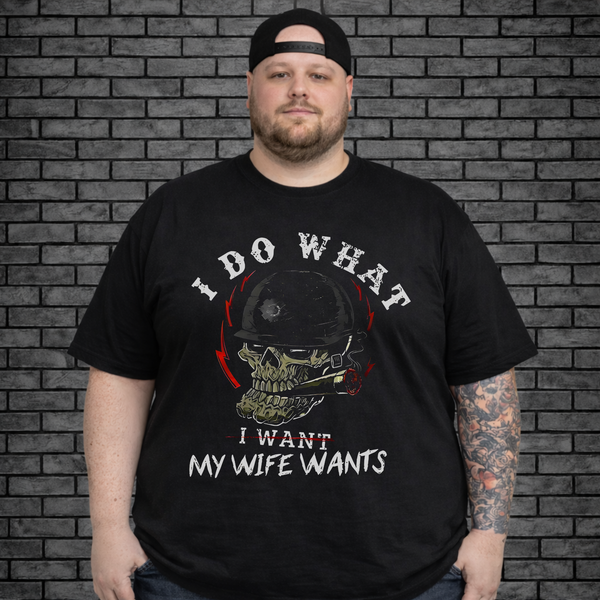 Plus size male wearing black short sleeve shirt with design on front that says I Do What I Want, What My Wife Wants