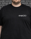 Plus size model wearing black crew neck Mentally Unhinged Tee