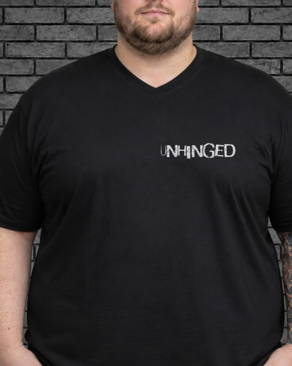 Plus size model wearing black v neck Mentally Unhinged Tee