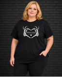 Plus size model wearing black crew neck Morally Grey Tee