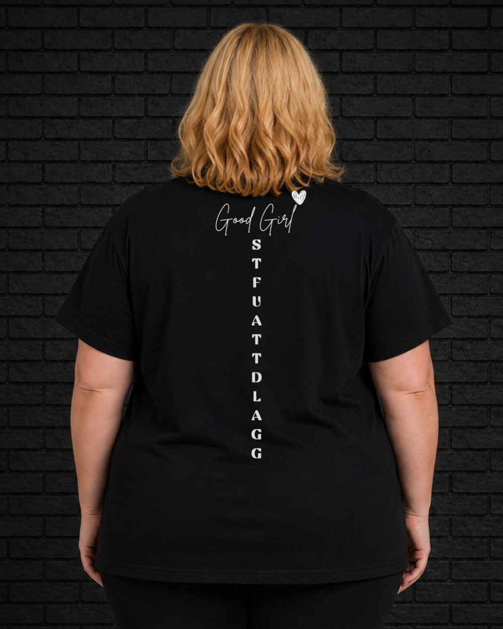 Plus size model wearing black Morally Grey Tee, view of back