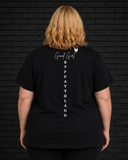 Plus size model wearing black Morally Grey Tee, view of back
